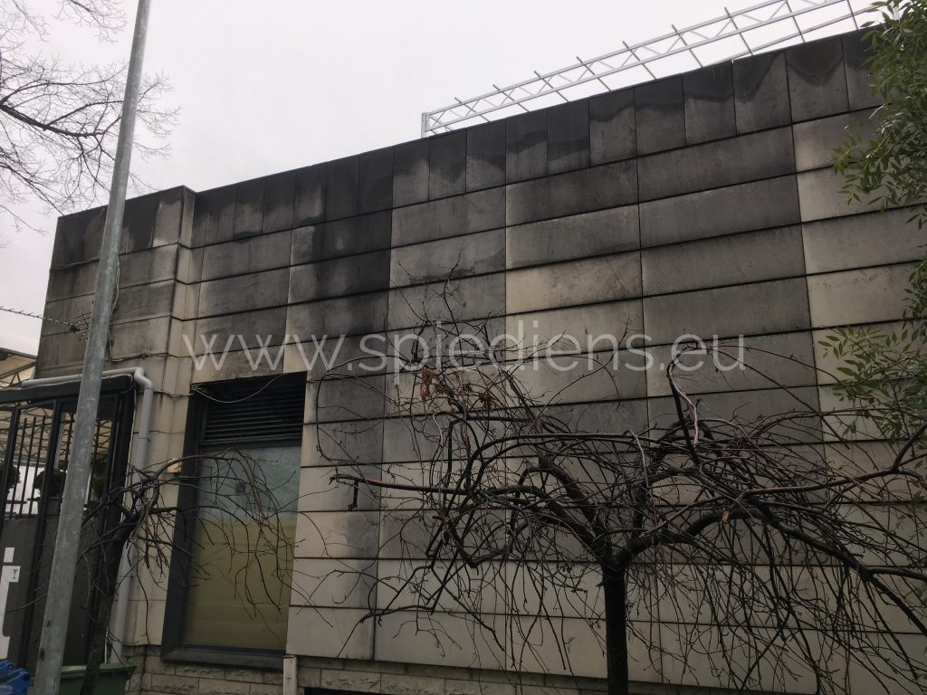 Before facade cleaning - dirty building wall